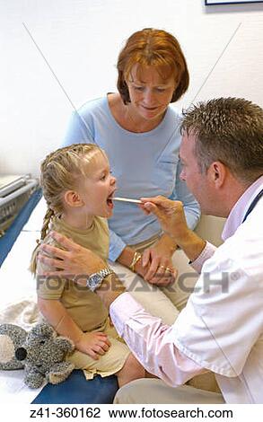Stock Image - Mother and daughter on the pediatrist. Fotosearch
