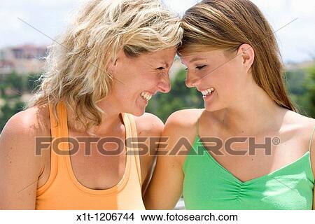 Mother and daughter. View Large Photo Image Picture - Mother and daughter.. Fotosearch