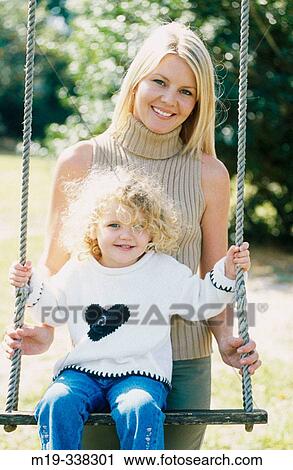 Mother and daughter playing View Large Photo Image Stock Image - Mother and daughter playing. Fotosearch