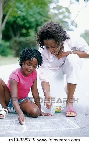 Mother and daughter playing View Large Photo Image Stock Photography - Mother and daughter playing. Fotosearch