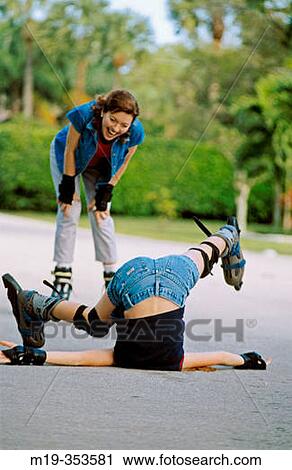 Mother and daughter rollerblading View Large Photo Image Stock Image - Mother and daughter rollerblading. Fotosearch