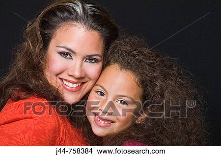 Mother and daughter, Smiling, Portrait View Large Photo Image Picture - Mother and daughter, Smiling, Portrait. Fotosearch