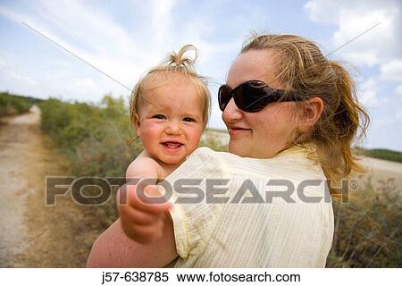 Mother and Daughter walking to the beach in Kos Island. Greece. View Large Photo Image Stock Photography - Mother and Daughter walking to the beach in Kos Island. Greece.. Fotosearch