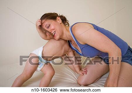 Mother and her 18 month old son View Large Photo Image Stock Photograph - Mother and her 18 month old son. Fotosearch