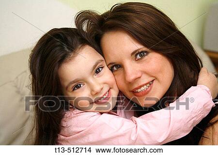Mother and her child girl happy together View Large Photo Image Picture - Mother and her child girl happy together. Fotosearch