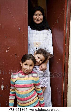 Mother and her childrens in the medina, Tangier. Morocco View Large Photo Image Picture - Mother and her childrens in the medina, Tangier. Morocco. Fotosearch