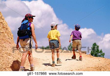 Mother and kids hiking on the Queen's Garden Trail. Bryce Canyon NP. Utah. USA View Large Photo Image Stock Photograph - Mother and kids hiking on the Queen's Garden Trail. Bryce Canyon NP. Utah. USA. Fotosearch