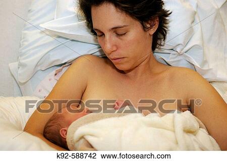 Mother and newborn baby in the hospital View Large Photo Image Stock Image - Mother and newborn baby in the hospital. Fotosearch