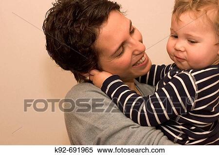 Mother and one year old boy View Large Photo Image Stock Photography - Mother and one year old boy. Fotosearch