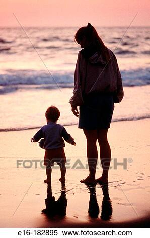 Mother and son at beach View Large Photo Image Stock Photography - Mother and son at beach. Fotosearch