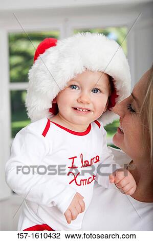 Mother and son at Christmas time View Large Photo Image Stock Image - Mother and son at Christmas time. Fotosearch