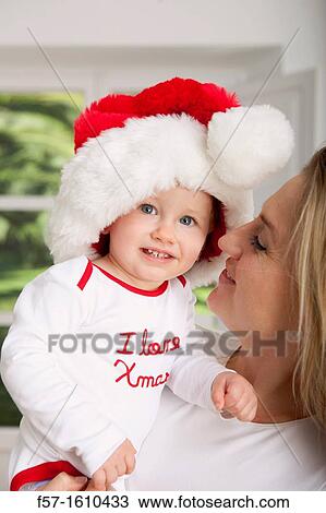 Mother and son at Christmas time View Large Photo Image Stock Image - Mother and son at Christmas time. Fotosearch