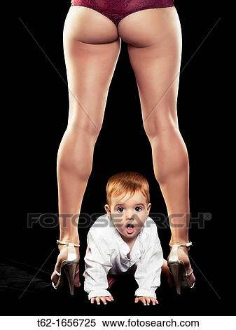Mother and son Children playing between the legs of his mother View Large Photo Image Stock Photography - Mother and son Children playing between the legs of his mother. Fotosearch