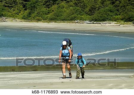 mother and son hiking, on Flores Island, West Coast, British Columbia, Canada View Large Photo Image Stock Image - mother and son hiking, on Flores Island, West Coast, British Columbia, Canada. Fotosearch