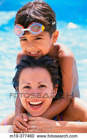 mother and son in a pool View Large Photo Image Stock Image - mother and son in a pool. Fotosearch
