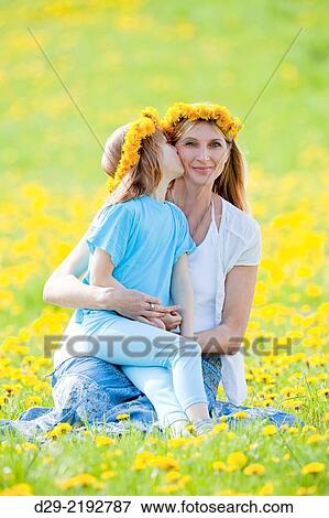mother and son picking flowers at dandelions field in spring. View Large Photo Image Stock Photo - mother and son picking flowers at dandelions field in spring.. Fotosearch