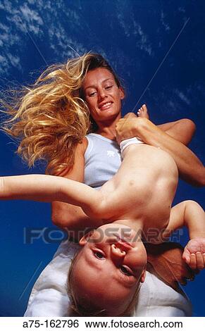 Stock Photograph - Mother and son. Fotosearch
