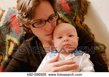 Mother and three_month_old baby View Large Photo Image Stock Photograph - Mother and three_month_old baby. Fotosearch