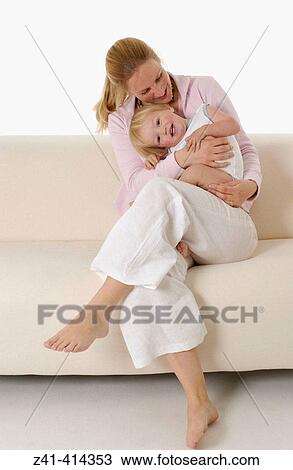 Mother and toddler at a bench View Large Photo Image Stock Image - Mother and toddler at a bench. Fotosearch
