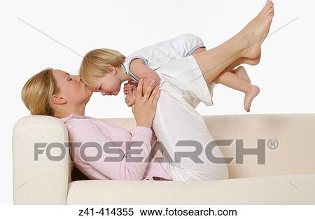 Mother and toddler at a bench View Large Photo Image Stock Photography - Mother and toddler at a bench. Fotosearch