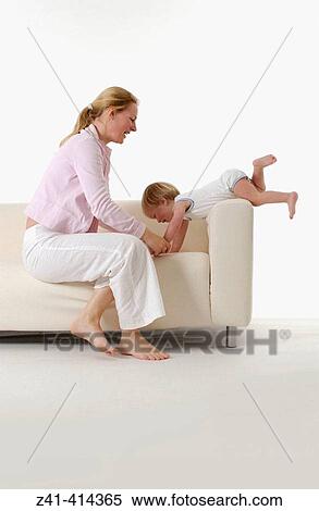 Mother and toddler at a bench View Large Photo Image Stock Photography - Mother and toddler at a bench. Fotosearch