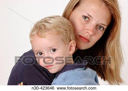 Mother and toddler boy embrace View Large Photo Image Stock Photograph - Mother and toddler boy embrace. Fotosearch