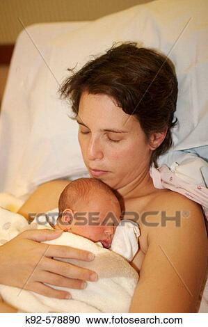 Mother and two day old infant View Large Photo Image Stock Image - Mother and two day old infant. Fotosearch