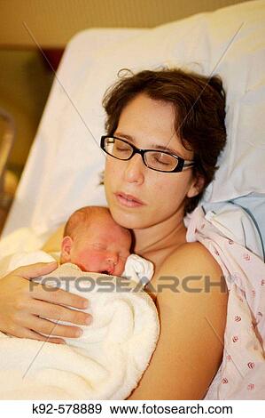Mother and two day old infant View Large Photo Image Stock Photo - Mother and two day old infant. Fotosearch