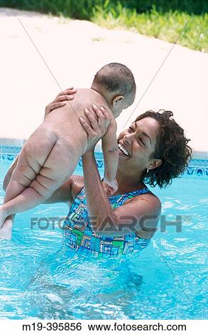 mother & baby in a swiming pool View Large Photo Image Stock Photograph - mother & baby in a swiming pool. Fotosearch