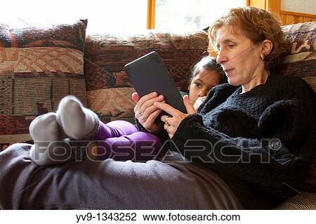 Mother-Daughter-Kindle View Large Photo Image Stock Image - Mother-Daughter-Kindle. Fotosearch