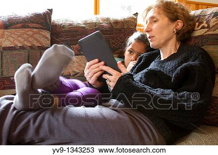 Mother-Daughter-Kindle View Large Photo Image Stock Image - Mother-Daughter-Kindle. Fotosearch
