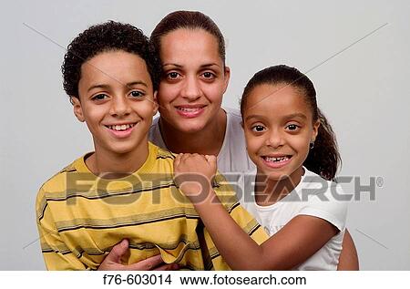 Picture - Mother embracing her children. Fotosearch