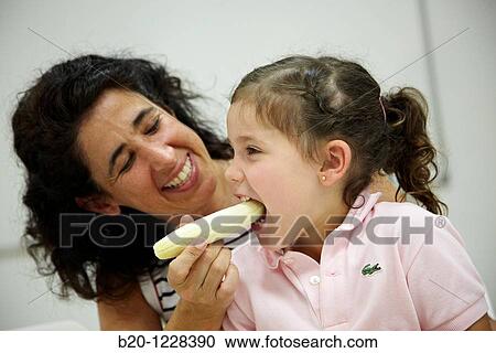 Mother giving a banana to her daughter, tasting session in sensory analysis lab, AZTI-Tecnalia Marine and Food Research Center, Derio, Bizkaia, Euskadi, Spain View Large Photo Image Stock Image - Mother giving a banana to her daughter, tasting session in sensory analysis lab, AZTI-Tecnalia Marine and Food Research Center, Derio, Bizkaia, Euskadi, Spain. Fotosearch