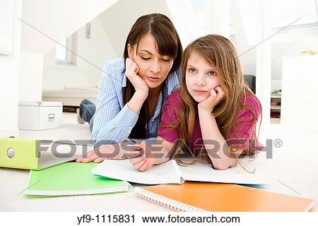 Mother Helping Daughter with Homework View Large Photo Image Stock Image - Mother Helping Daughter with Homework. Fotosearch