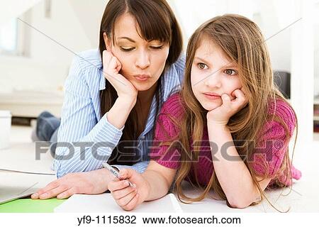 Mother Helping Daughter with Homework View Large Photo Image Stock Image - Mother Helping Daughter with Homework. Fotosearch