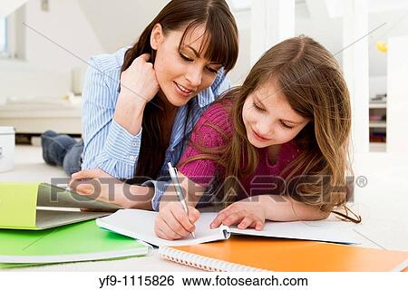 Mother Helping Daughter with Homework View Large Photo Image Stock Photograph - Mother Helping Daughter with Homework. Fotosearch