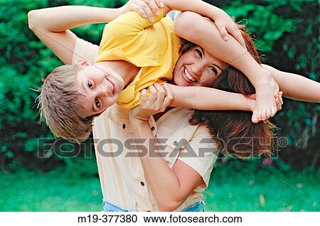 mother holding her son View Large Photo Image Stock Image - mother holding her son. Fotosearch