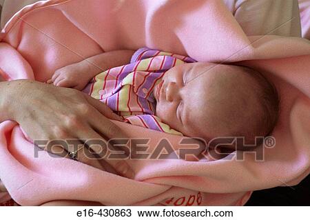 Mother holding newborn girl. View Large Photo Image Stock Image - Mother holding newborn girl.. Fotosearch