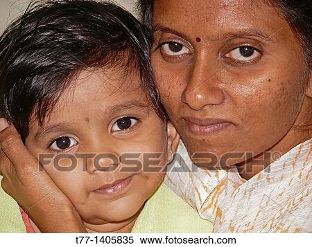 Mother hugging her daughter View Large Photo Image Stock Photography - Mother hugging her daughter. Fotosearch