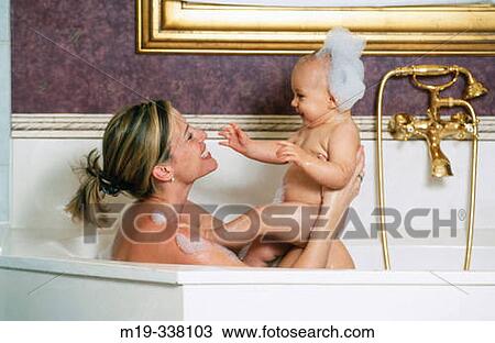 mother with baby in bath tub View Large Photo Image Stock Image - mother with baby in bath tub. Fotosearch