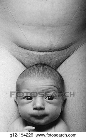 Mother with cesarean scar and newborn baby View Large Photo Image Stock Photograph - Mother with cesarean scar and newborn baby. Fotosearch