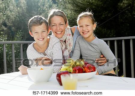 Stock Photo - Mother with children. Fotosearch