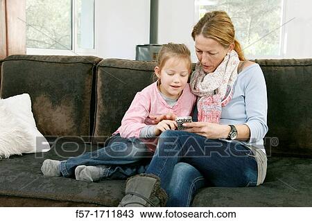 Stock Image - Mother with daughter. Fotosearch