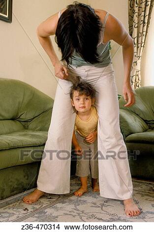 Mother with daughter under legs View Large Photo Image Picture - Mother with daughter under legs. Fotosearch