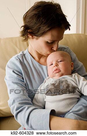 Mother with four month old baby. View Large Photo Image Stock Photo - Mother with four month old baby.. Fotosearch