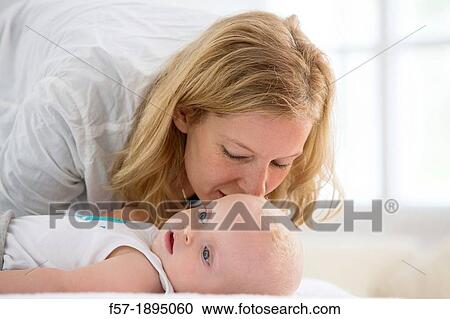 Mother with her baby son View Large Photo Image Stock Image - Mother with her baby son. Fotosearch