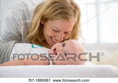 Stock Image - Mother with her baby son. Fotosearch