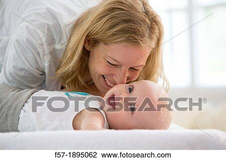 Mother with her baby son View Large Photo Image Stock Image - Mother with her baby son. Fotosearch