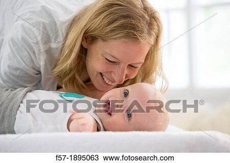 Mother with her baby son View Large Photo Image Stock Image - Mother with her baby son. Fotosearch