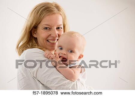 Mother with her baby son View Large Photo Image Stock Photo - Mother with her baby son. Fotosearch